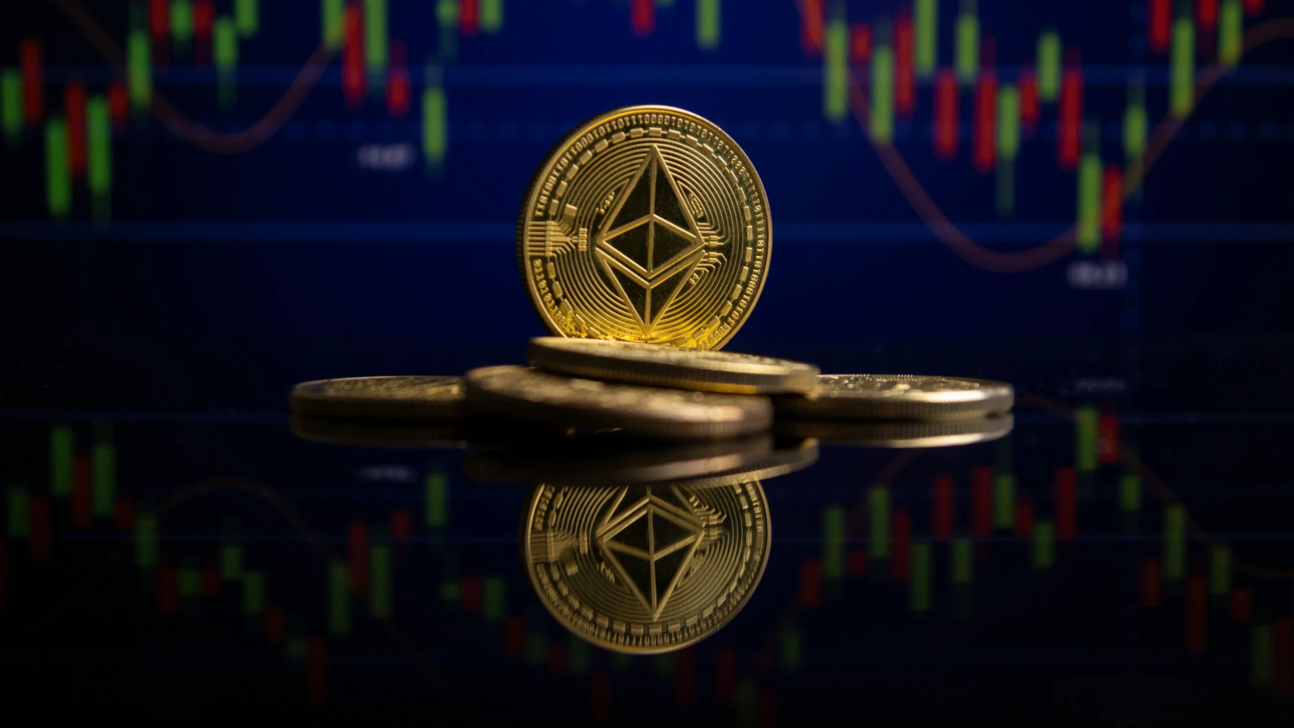 Ethereum Coins with Financial Chart Background What is Ethereum - Close-up of Ethereum coins with a financial chart background, symbolizing its role in cryptocurrency trading
